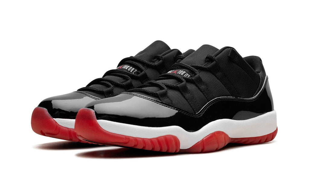 Air Jordan 11 Low Sneakers – Black, Red & White
