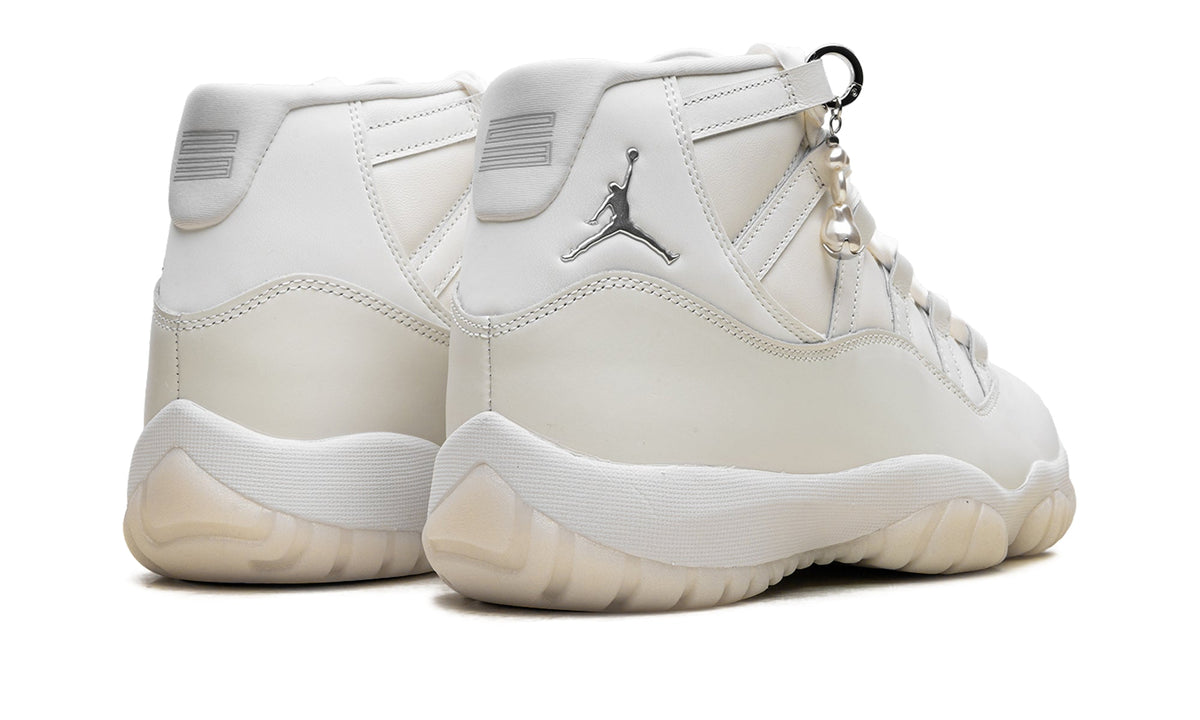 Air Jordan 11 Retro High-Top Sneakers - White and Cream with Metallic Silver Accents