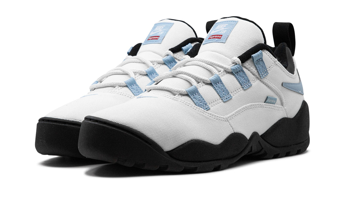 Supreme x Nike SB Darwin Low Sneakers – White, Light Blue & Black with Reverse Swooshes