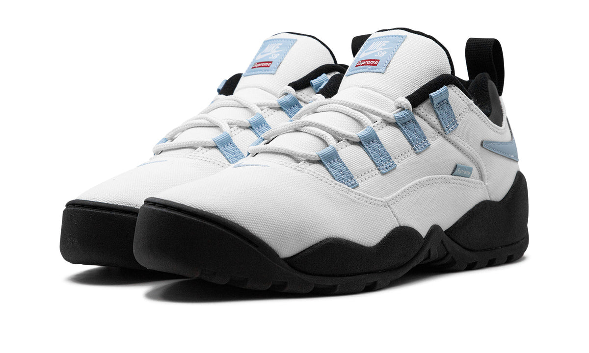 Supreme x Nike SB Darwin Low Sneakers – White, Light Blue & Black with Reverse Swooshes